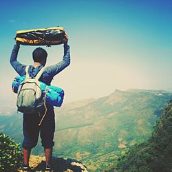 Woman standing on mountain landscape