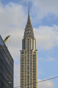 Low angle view of skyscrapers against sky