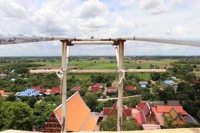 High angle view of buildings in city against sky