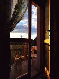 Buildings seen through glass window