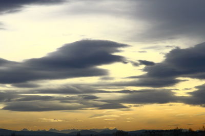 Low angle view of dramatic sky during sunset