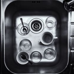 Directly above shot of cups in kitchen sink