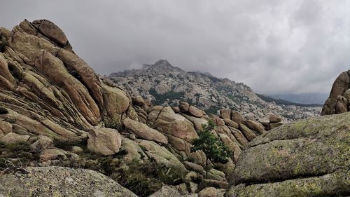 View of rocky mountains against sky