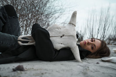 Portrait of girl lying on floor