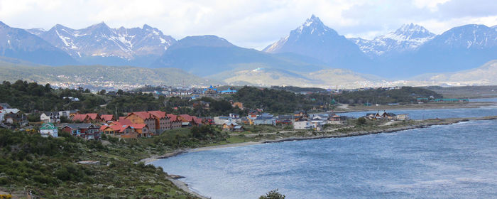 Scenic view of mountains against cloudy sky