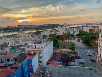 High angle view of townscape against sky at sunset