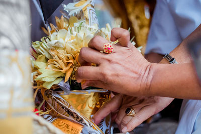 Midsection of woman holding food