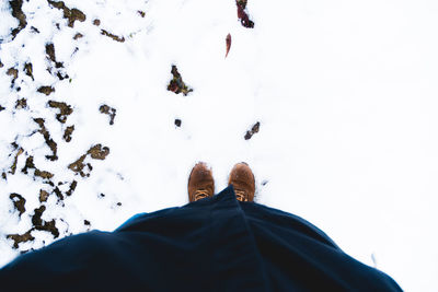 Low section of woman standing on floor