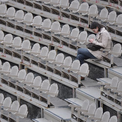 Man sitting in stadium