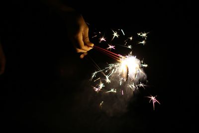 Firework display at night