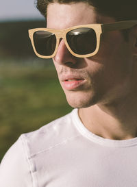 Close-up of young man wearing sunglasses