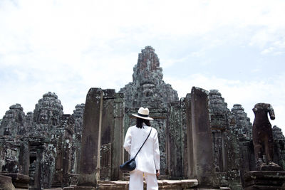 Man standing at historic temple