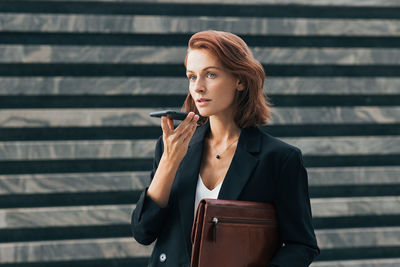 Young woman using mobile phone