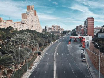 Cars on road against sky