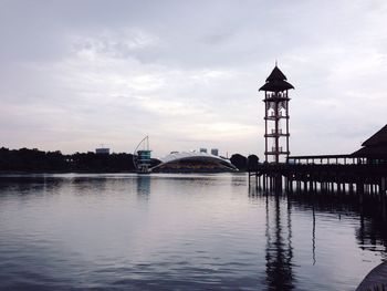 Scenic view of city against sky at dusk