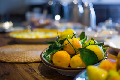 Close-up of fruits in plate on table