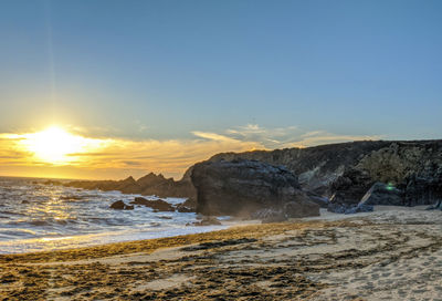 Scenic view of sea against sky during sunset