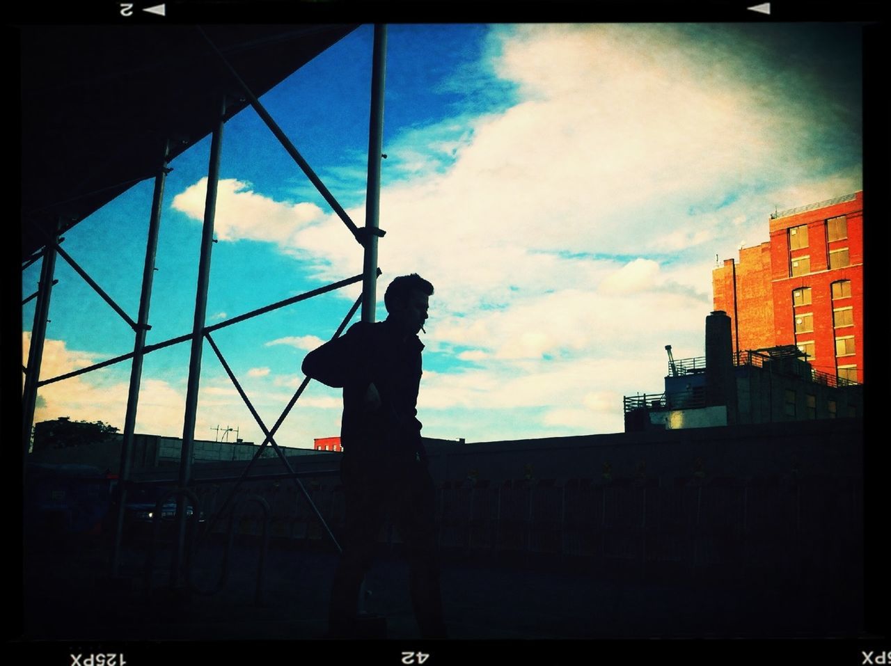 architecture, built structure, building exterior, silhouette, sky, low angle view, cloud - sky, city, building, sunset, cloud, dusk, auto post production filter, transfer print, outdoors, window, residential building, cloudy, no people, residential structure