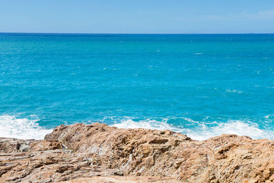 Scenic view of sea against clear sky