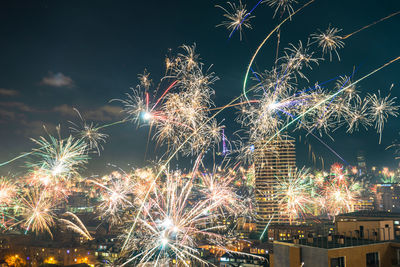 Firework display at night