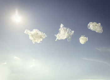 Low angle view of snow on sunny day