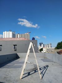 Built structure against blue sky in city