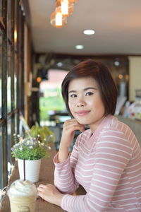 Portrait of a smiling young woman