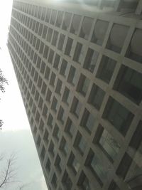 Low angle view of modern building against sky