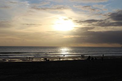 Scenic view of sea at sunset