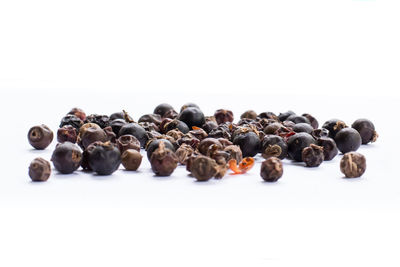 High angle view of blueberries against white background