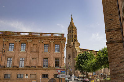 Low angle view of building against blue sky