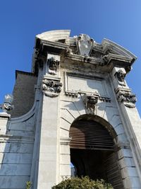 Low angle view of historic building against clear sky
