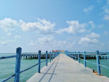 Pier over sea against sky