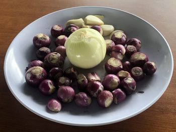 High angle view of fruits in plate on table