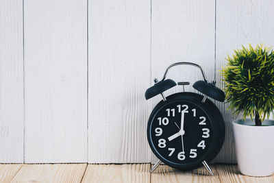 Close-up of clock on wall