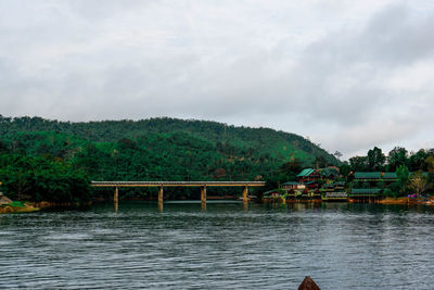 Bridge over river against sky