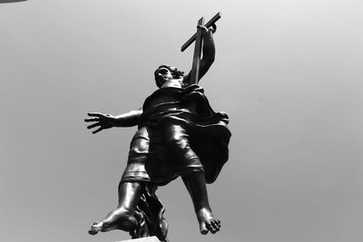 Low angle view of statue against sky