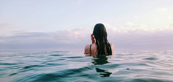 Scenic view of sea at sunset