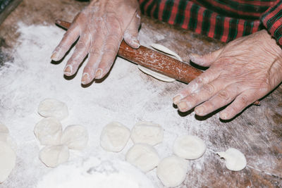 Close-up of man preparing food