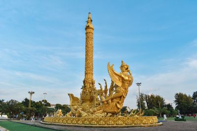 Statue of temple against sky