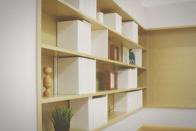 Shelves attached in wall at home