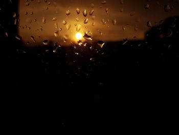 Close-up of raindrops on windshield