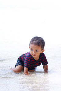 Portrait of boy on beach