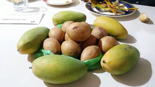 Close-up of fruits in plate on table