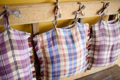 Close-up of clothes drying on wood