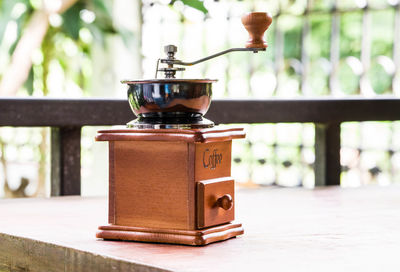 Close-up of old tea light on table