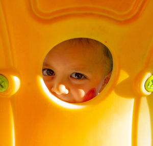 Close-up portrait of young woman wearing mask