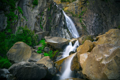 Scenic view of waterfall in forest