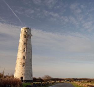 Low angle view of lighthouse against sky