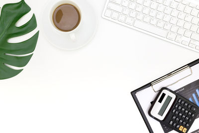 High angle view of coffee cup on table